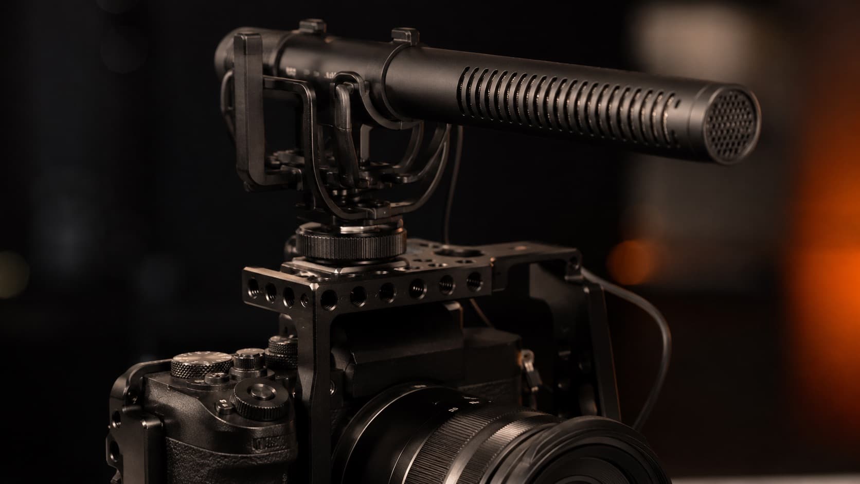 Shotgun microphone mounted on top of the camera