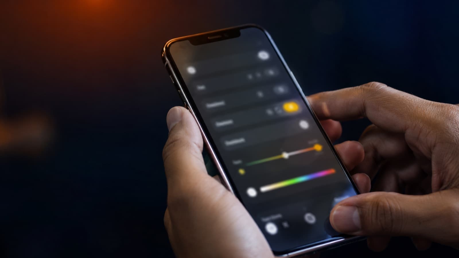 Hands holding a phone in the camera settings menu